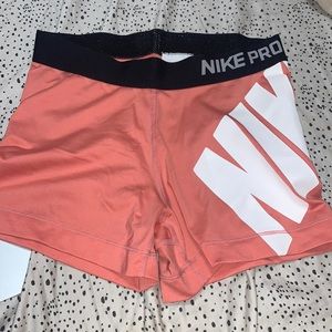 peachy pink nike pro shorts, size medium
